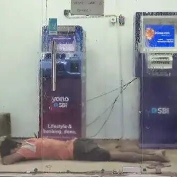 എസ്ബിഐ എടിഎം കൗണ്ടർ സ്വന്തം ബെഡ്റൂമാക്കി യുവാവ്; എസിയുടെ തണുപ്പിൽ സുഖനിദ്ര, വീഡിയോ കാണാം